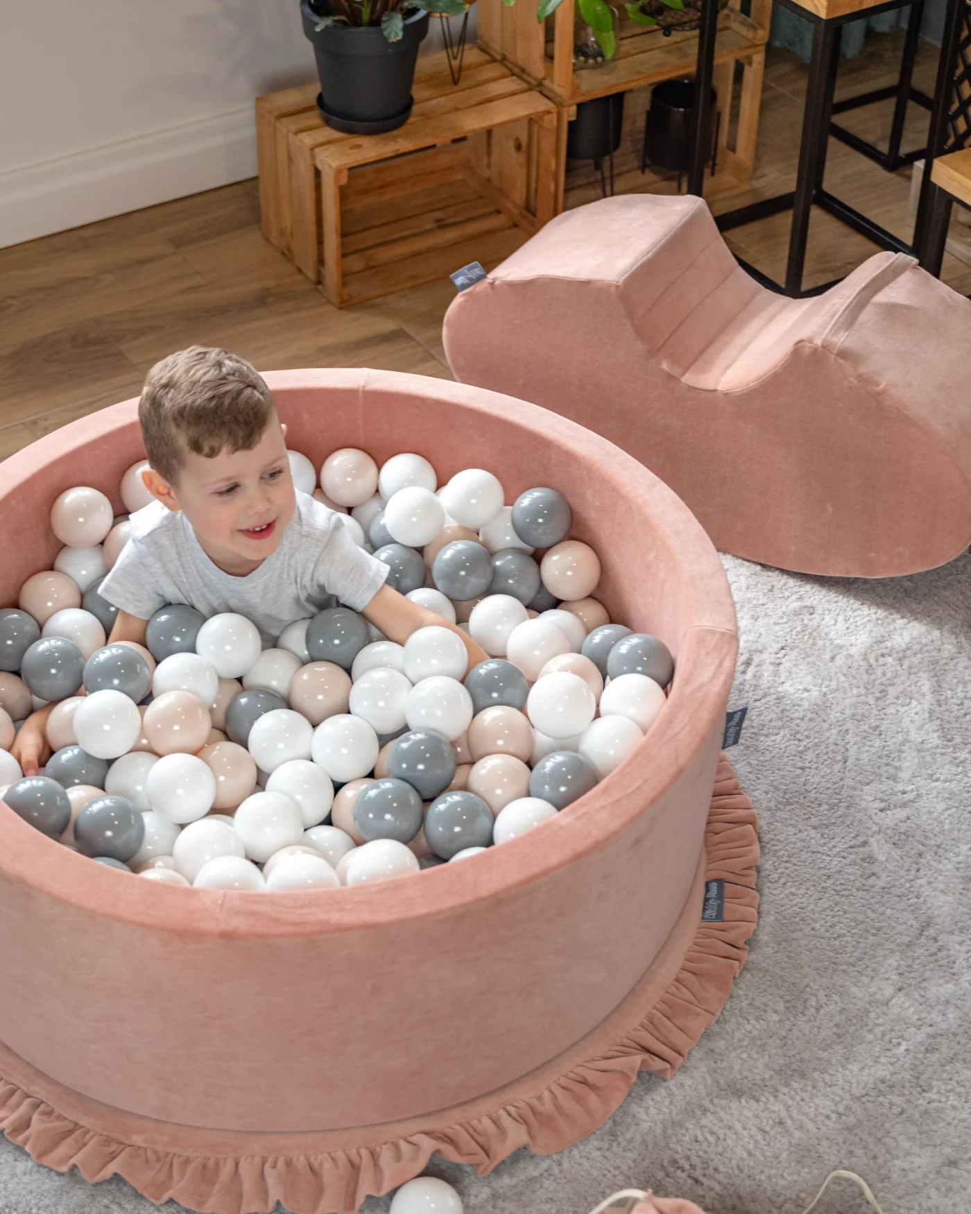 Colorful KiddyMoon balls in a ball pit — close-up