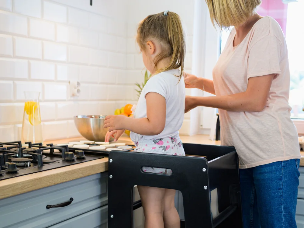 Mother and child baking muffins